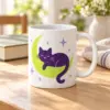 Cosmic Cat Ceramic Mug — lifestyle view
