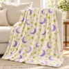 Cozy Orbit Velveteen Plush Blanket — lifestyle view